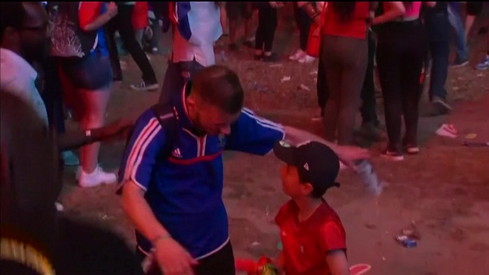 Portugal invites sad France fan to visit